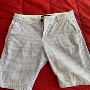 short for young man. Rock Republic. Color white with dark Stripes